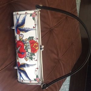 Little Earth tip tattoo inspired purse